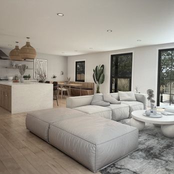 Home Renovations - a modern living room with a large couch - General Contractors Near Me - Norwalk, California
