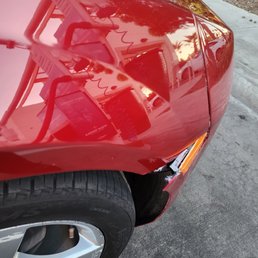 Damages to passenger side fender / bumper after driving thru Super Star Car Wash on Centre City Parkway & Mission Ave in Escondido Ca.