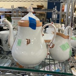 The Goodwill Store - Old goodwill setup with spacious metal racks and lots of crockery