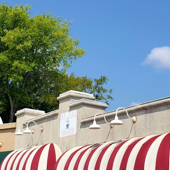 Our Place - a row of awnings on the side of a building - Breakfast & Brunch Near Me - Gardendale, Alabama Our Place - a row of awnings on the side of a building - Breakfast & Brunch Near Me - Gardendale, Alabama