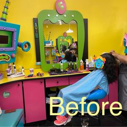 Snip-its Haircuts for Kids - Colorful and kid friendly stations inside the salon.