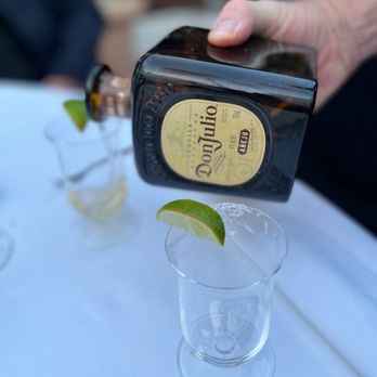 Intermezzo By Wine Cask - a person pouring a drink - New American Near Me - Santa Barbara, California Intermezzo By Wine Cask - a person pouring a drink - New American Near Me - Santa Barbara, California