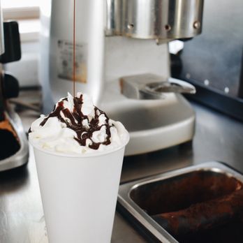 Espresso Evergreen - Mocha Latte with a Chocolate Drizzel - Coffee & Tea Near Me - Evergreen, Colorado Espresso Evergreen - Mocha Latte with a Chocolate Drizzel - Coffee & Tea Near Me - Evergreen, Colorado