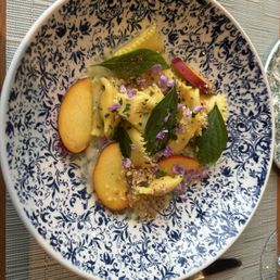 Agnolotti---pasta stuffed with creamy sweet corn with pickled peaches Agnolotti---pasta stuffed with creamy sweet corn with pickled peaches