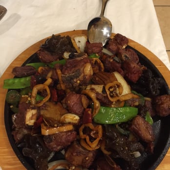 Masterpiece - Spare ribs - this was the spiciest item we ordered even though there was only 5 peppers next to it - Szechuan Near Me - Duluth, Georgia