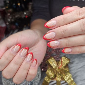 Dorado Nail Bar - Red french tip, glitter gold outline, and a small white star with a center diamond - Nail Salons Near Me - Sugar Land, Texas Dorado Nail Bar - Red french tip, glitter gold outline, and a small white star with a center diamond - Nail Salons Near Me - Sugar Land, Texas