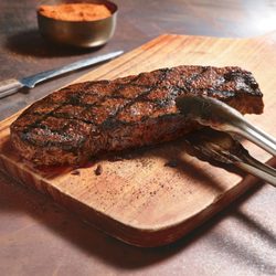 LongHorn Steakhouse - LongHorn’s New York Strip is fire-grilled to enhance its distinctive flavor, this thick cut is a steakhouse classic.