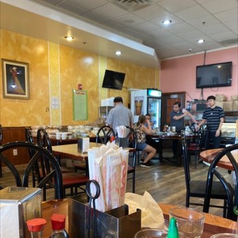 Pho Viet - people sitting at tables in a restaurant - Vietnamese Near Me - Philadelphia, Pennsylvania Pho Viet - people sitting at tables in a restaurant - Vietnamese Near Me - Philadelphia, Pennsylvania