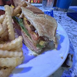 Rookie's Bar & Grill - I took a bite out of this giant club sandwich.
