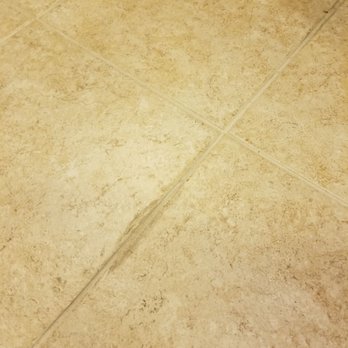 Max & K Carpet Cleaning - The "after" pics. He applied shiny, rubbery silicone caulk to matte grout lines & tile, then undiluted "Viper Venom" to try to remove it! - Carpet Cleaning Near Me
