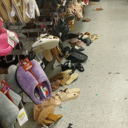dd's DISCOUNTS - A wall of shoes floor to ceiling.