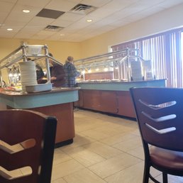 a view of a restaurant with a buffet