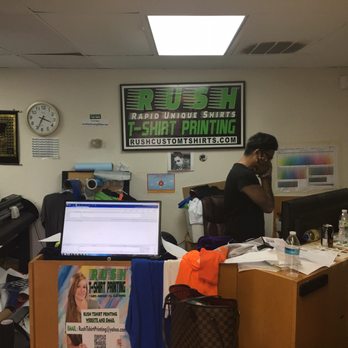 Rush Tshirt Printing - Raza talking on the phone! He will help y'all out! He can talk though! But he's cool people - Embroidery & Crochet Near Me - Houston, Texas