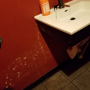 The Oakland - Th coctails were fine, but when you're selling a classy experience, don't let your bathrooms look like this. - Cocktail Bars Near Me - Ferndale, Michigan