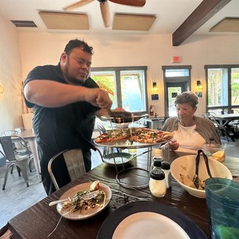 Arte Pizza - Jimmy serving up our pizza! - Pizza Near Me - Fernandina Beach, Florida