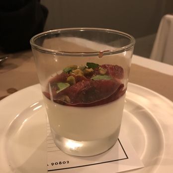Ellie's - Panacotta with blood orange, pistachios and mint - Italian Near Me - Long Beach, California Ellie's - Panacotta with blood orange, pistachios and mint - Italian Near Me - Long Beach, California