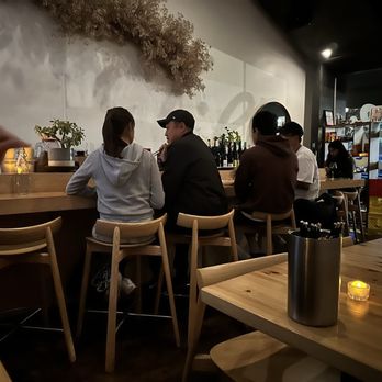 Jilli - a group of people sitting at a bar - Korean Near Me - Los Angeles, California