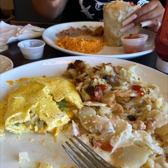 Broken Yolk Cafe - Omelet with ham ,very bad ,box egg,2 pieces of ham ,rough potatoes,and the burrito ,rice no flavor and beans too . - Breakfast & Brunch Near Me - Orange, California Broken Yolk Cafe - Omelet with ham ,very bad ,box egg,2 pieces of ham ,rough potatoes,and the burrito ,rice no flavor and beans too . - Breakfast & Brunch Near Me - Orange, California