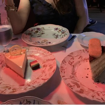 Carbone - Lemon Ricotta Cheesecake on the left, Tiramisu on the right - Italian Near Me - New York, New York Carbone - Lemon Ricotta Cheesecake on the left, Tiramisu on the right - Italian Near Me - New York, New York