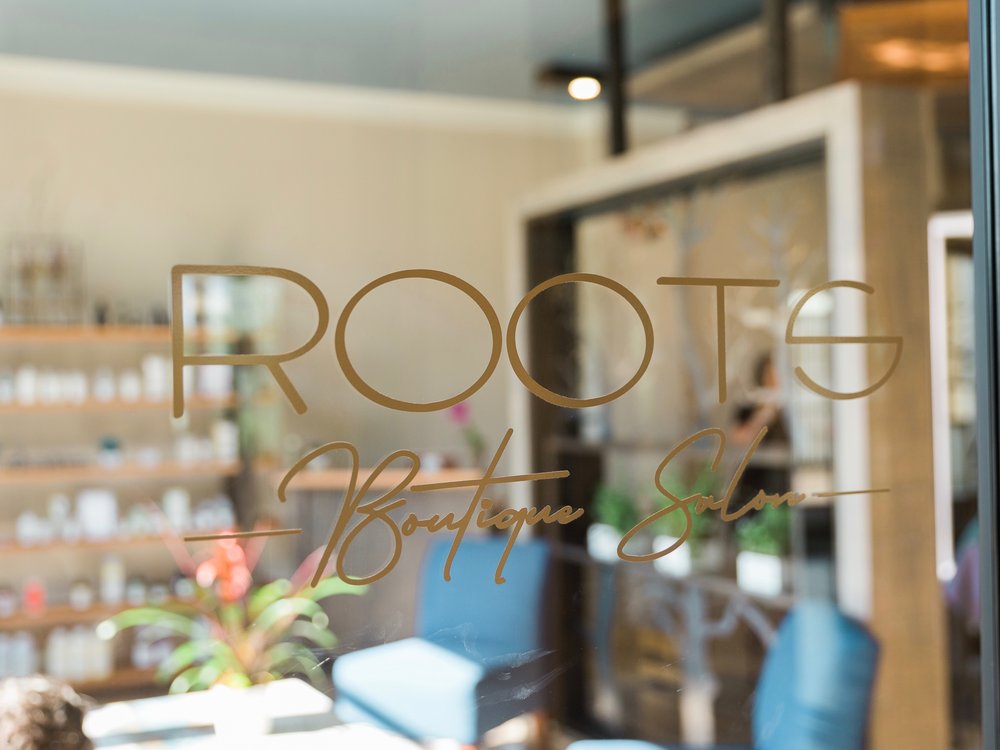 Roots Boutique Salon Logo