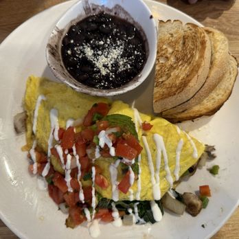 Broken Yolk Cafe - MOM Spinach, mushroom, onion, red and green bell pepper. Topped with avocado, salsa fresca, and sour cream. (530 cal) - American Near Me - Glendora, California
