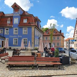 Bräustüberl Zur Kanne - Lots of seating outside with a lovely view of the surrounding old buildings. The benches are public.