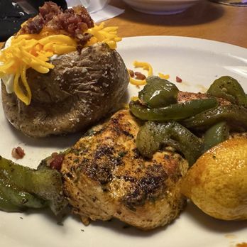 Texas Roadhouse - Herb Crusted Chicken with loaded Baked Potato 12/03/2025 - Steakhouses Near Me - Greensboro, North Carolina