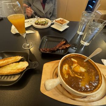Tasty - Avocado toast and cooked eggs in tomato sause and mimosa. - Salad Near Me - Gastonia, North Carolina Tasty - Avocado toast and cooked eggs in tomato sause and mimosa. - Salad Near Me - Gastonia, North Carolina