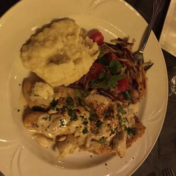 Cotton Gin Restaurant & Lodging - Blackened red snapper with mashed potatoes. - Hotels Near Me - Fredericksburg, Texas Cotton Gin Restaurant & Lodging - Blackened red snapper with mashed potatoes. - Hotels Near Me - Fredericksburg, Texas