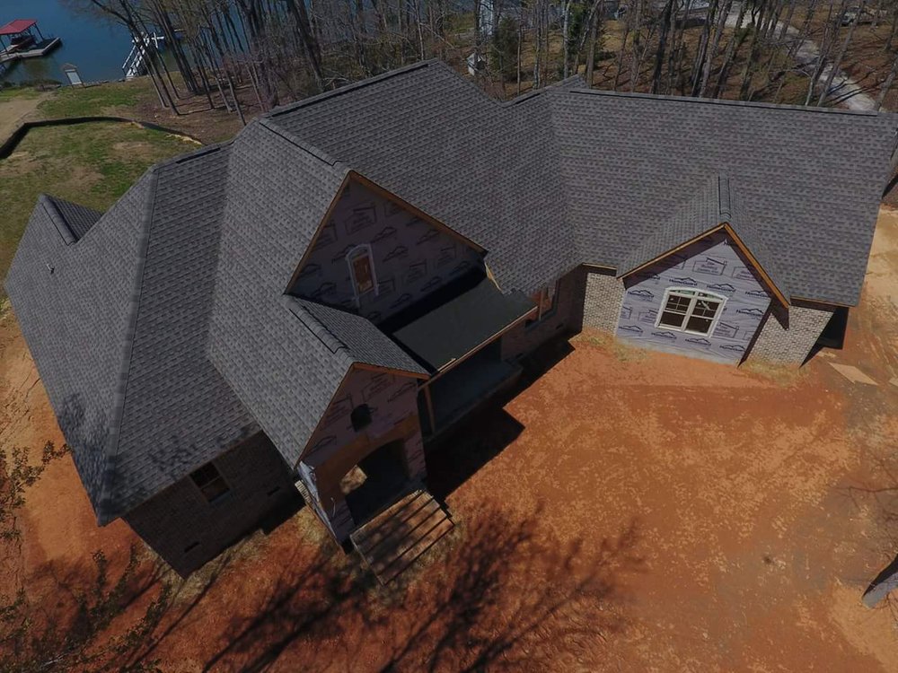 Slide of The Roofing Guy