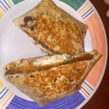 Nacho Mama's - Stuffed tortilla with beans, beef, lettuce, sour cream, and cheese. - Mexican Near Me - Marco Island, Florida Nacho Mama's - Stuffed tortilla with beans, beef, lettuce, sour cream, and cheese. - Mexican Near Me - Marco Island, Florida