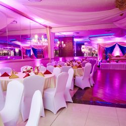 Exclusive Events - Stage and hall décor for our wedding reception.