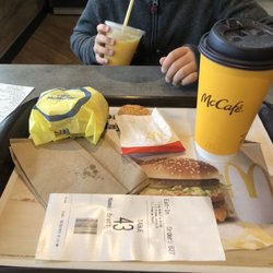 McDonald's - Egg McMuffin, hash brown, and large coffee.