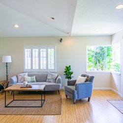 Roam Rentals + Design - Light, welcoming, and touches of local life bring this otherwise awkward living room to life.