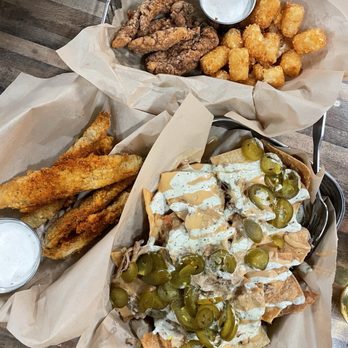 Mad Beach Craft Brewing - Tom's Pork Pullin' Nachos, fried pickles, kids meal tenders & tots - Breweries Near Me - Madeira Beach, Florida Mad Beach Craft Brewing - Tom's Pork Pullin' Nachos, fried pickles, kids meal tenders & tots - Breweries Near Me - Madeira Beach, Florida