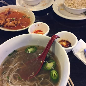 Dee Kitchen - Finished Pho with beef slices, orange chicken, side of fried rice - Thai Near Me - Idaho Falls, Idaho