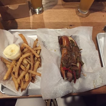 Kardinal Hall - cerdito sausage with hot peppers & onions and fries with garlic aioli - Beer Gardens Near Me - Charlottesville, Virginia Kardinal Hall - cerdito sausage with hot peppers & onions and fries with garlic aioli - Beer Gardens Near Me - Charlottesville, Virginia