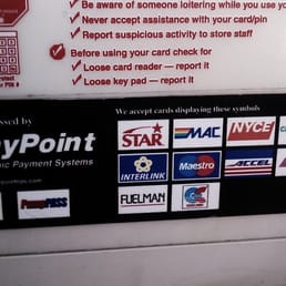 a paypoint sign on a bus a paypoint sign on a bus