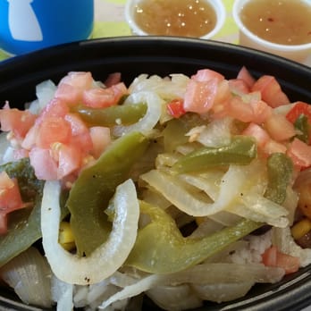 Pollo Tropical - Thoroughly enjoyed the Tropichop with Shrimp white rice, black beans and everything else... yummy - Latin American Near Me - Kissimmee, Florida