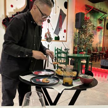 Echate Pa lla - Preparing to serve paella - Tapas Bars Near Me - Doral, Florida Echate Pa lla - Preparing to serve paella - Tapas Bars Near Me - Doral, Florida