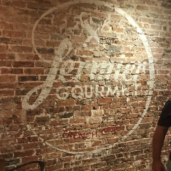 Fermier Gourmet - Logo on exposed brick wall. Interior. - French Near Me - Paris, 75 Fermier Gourmet - Logo on exposed brick wall. Interior. - French Near Me - Paris, 75