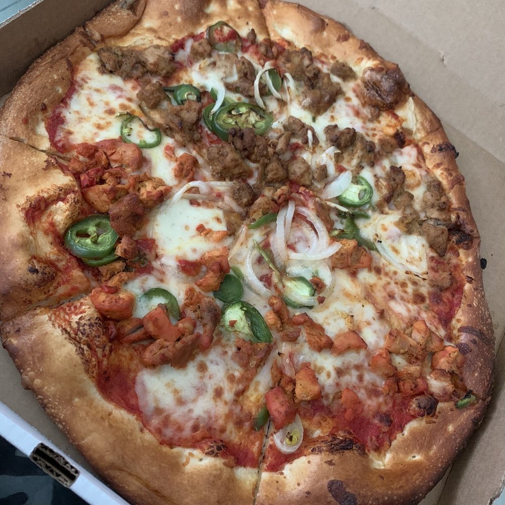 5. Half Chicken Tikka and 1/2 Chicken Bihari Pizza 5. Half Chicken Tikka and 1/2 Chicken Bihari Pizza