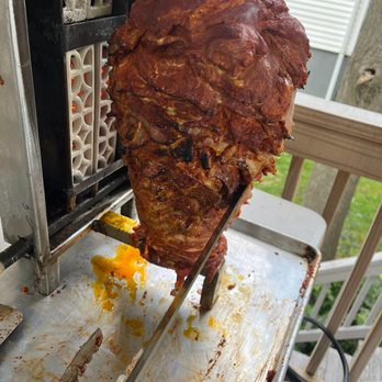 Taqueria Casa Oaxaca - meat being cooked on a grill - Mexican Near Me - Everett, Massachusetts