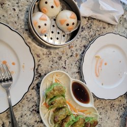 Yummy House - Steamed pork bunns and fried dumplings