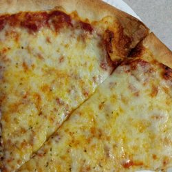 Nina's  II Pizza - Over Cheesed!