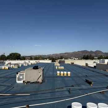 Anchor Point Roofing - Primer and polyester webbing ready for silicone - Roofing Near Me