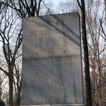 Theodore Roosevelt Island - Pillars surrounding the monument with words dedicated to Theodore Roosevelt's mission and legacy - Parks Near Me Theodore Roosevelt Island - Pillars surrounding the monument with words dedicated to Theodore Roosevelt's mission and legacy - Parks Near Me