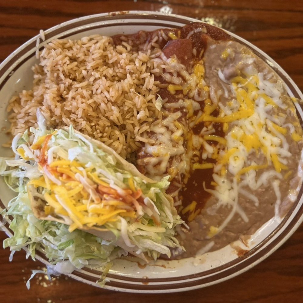 one ground taco + one chicken enchilada with rice & beans = $16.25 one ground taco + one chicken enchilada with rice & beans = $16.25