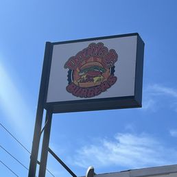 Sign above restaurant Sign above restaurant