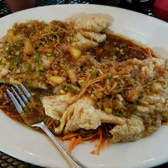 Tin Fish - Whole red snapper filleted in Asian sauce - New American Near Me - Sunrise, Florida Tin Fish - Whole red snapper filleted in Asian sauce - New American Near Me - Sunrise, Florida